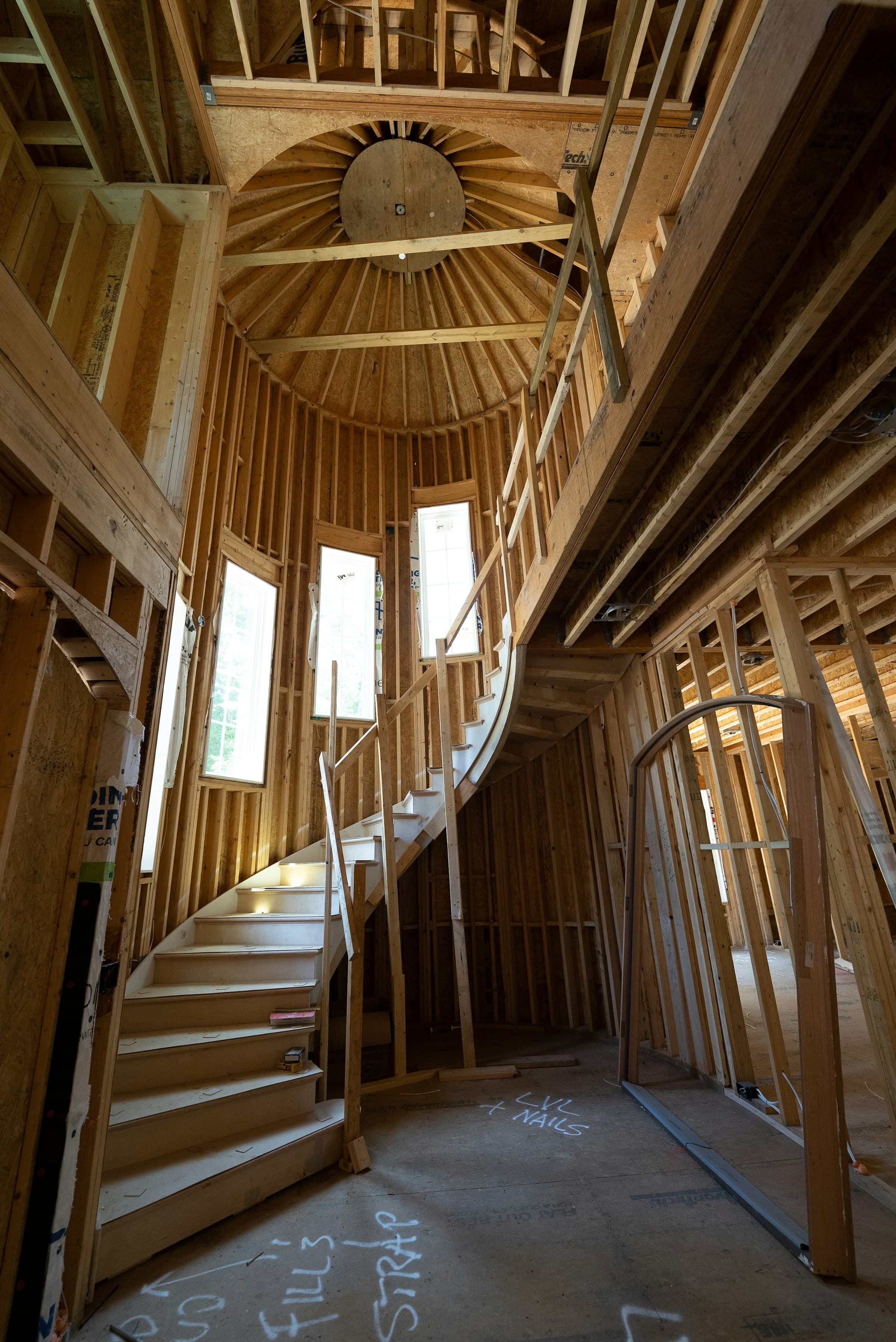 Carpenter woodworking with tools and materials for interior finishing